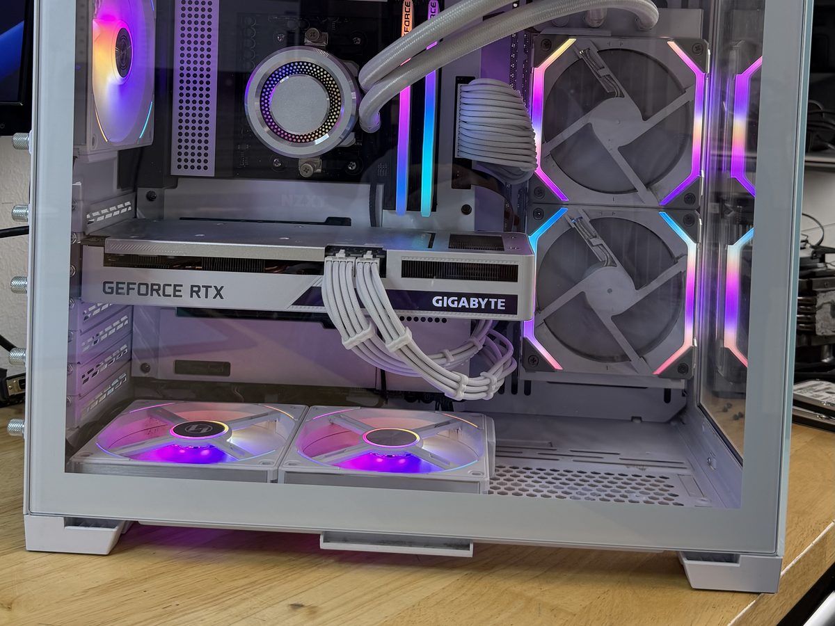 Compact white build with a GeForce RTX graphics card and liquid cooling